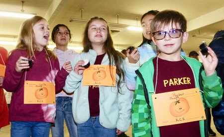 Kings Christian students make butter at the annual Farm Show.